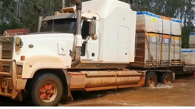 Unbelievably Long Monster Road Train at a river crossing in remote Australia