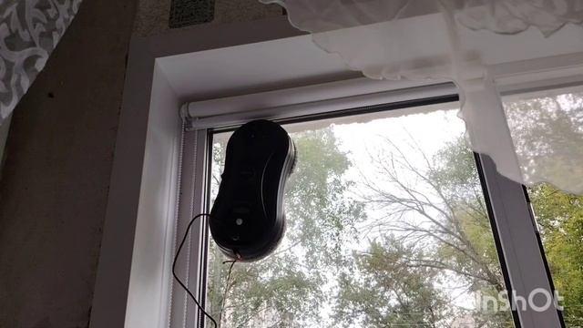 Мою окно Роботом - мойщиком окон.
