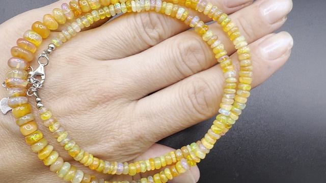 Колье из огненного опала Камни формы рондель   Бусины 7-8 мм до 3-4 мм Длина 42-44см ОПА113