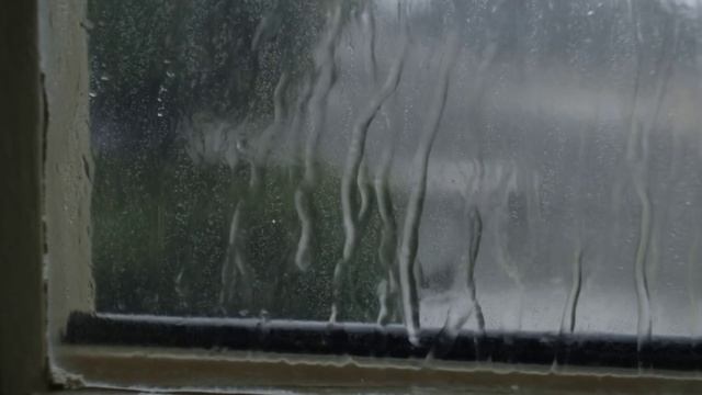 Strange Rain Behind the Glass
