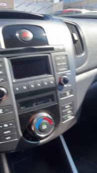 Обзор на Kia Cerato Седан 1.6 AT 2009г