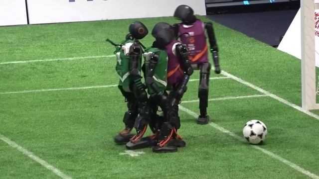 Humanoid AI robots play 3v3 football tournament in China