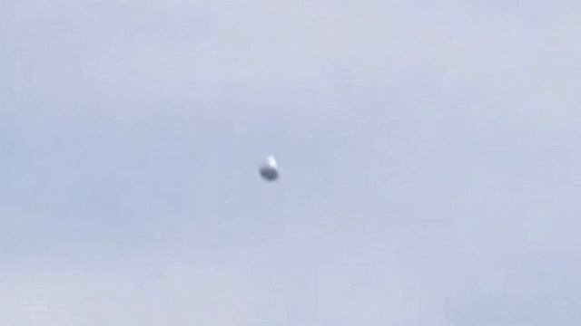 Серебряная Сфера Над Токио