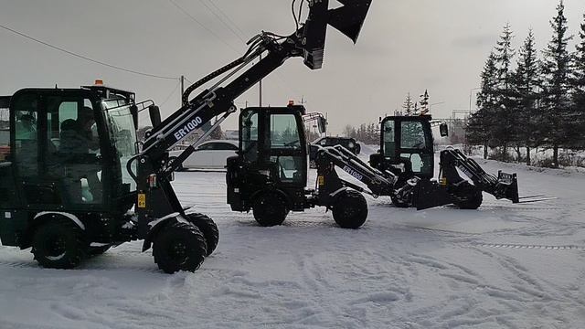 Телескопический погрузчик SHENG ER1000 с челюстным ковшом