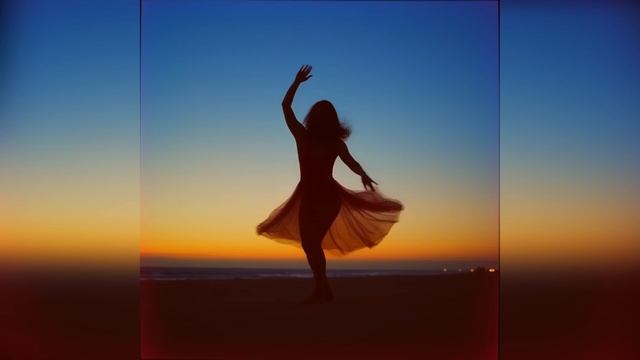 Она танцует на песке