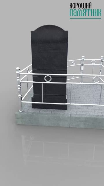 Памятник на могилу в виде вертикальной стелы с оградой и скамейкой из мраморной крошки