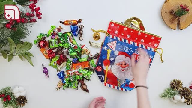 Текстильная новогодняя упаковка сумка-мешок "Дедушка" с ручками и завязками в верхней части.