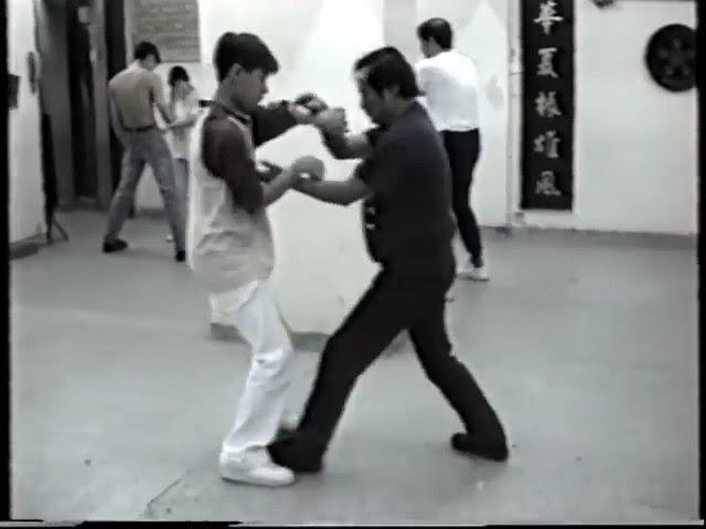 Learning poon chi sau in forward and reverse motion, by GM Wong Shun Leung.