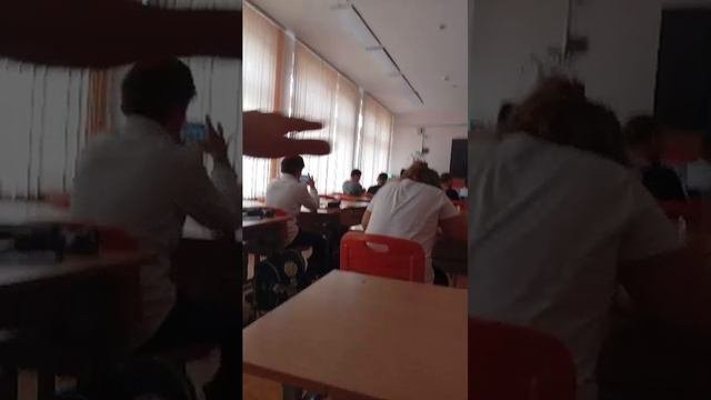 в школе