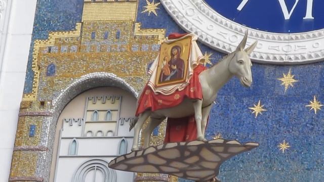 Часы с осликом