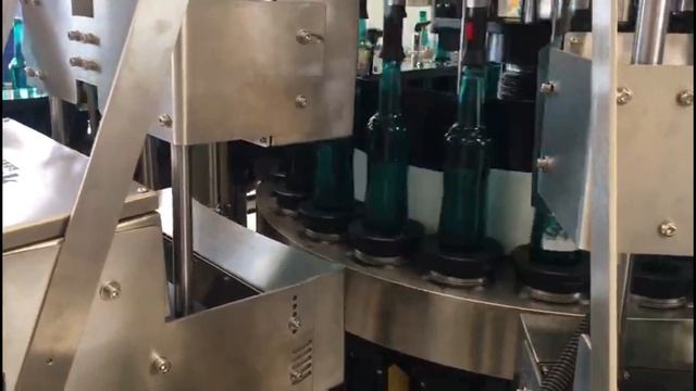 Система ориентирования бутылки в этикетировочной машине XispVAS video