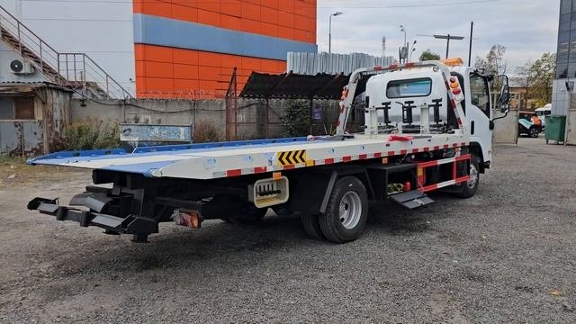 Видеообзор2 эвакуатор ISUZU ELF KV600 БЕЛЫЙ ISUZU ELF KV100 KV600 P700 P100 🚚ISUZU ELF 2025-09-25 1