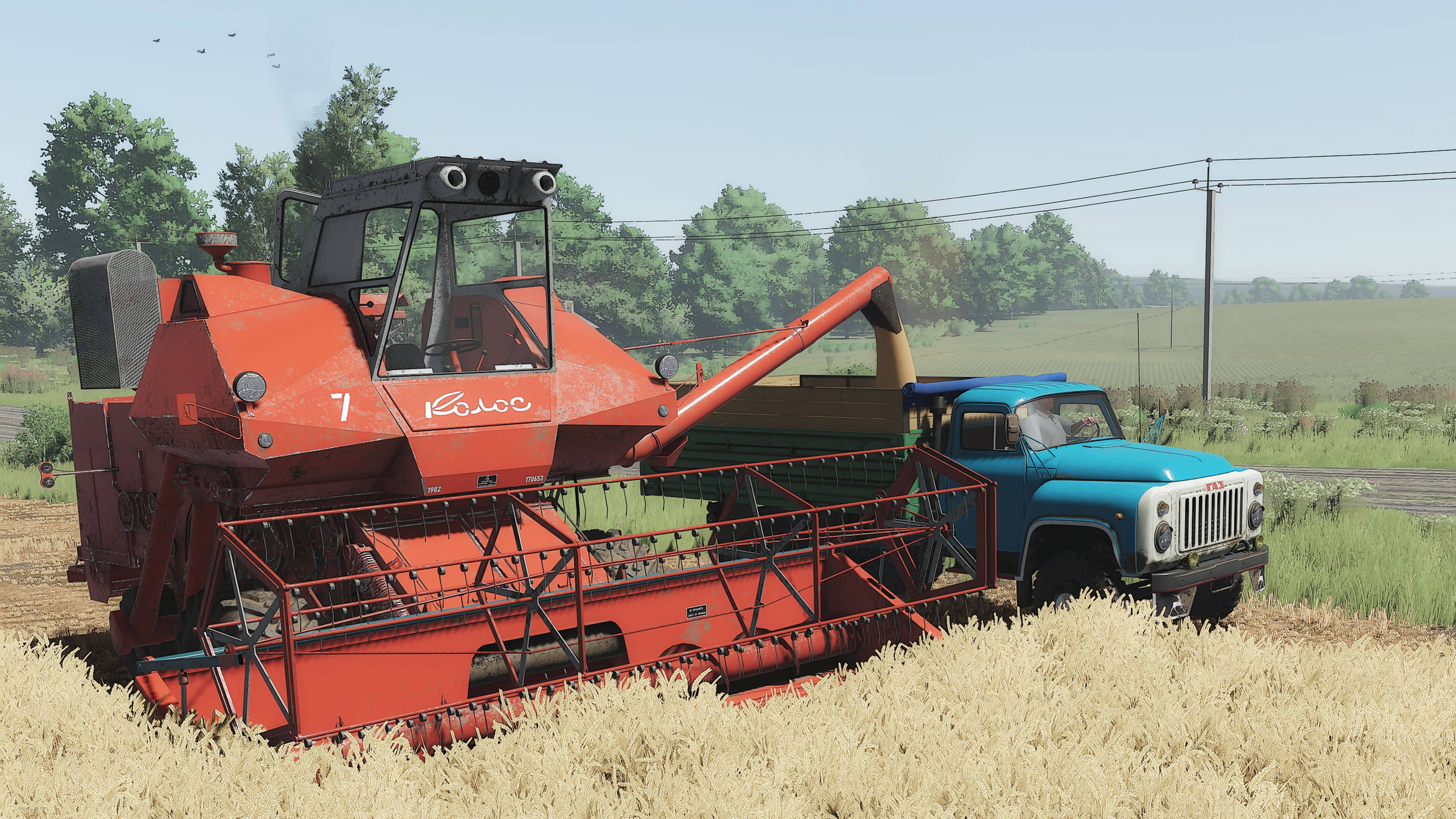 Старичок комбайн "КОЛОС" СК-6 убирает пшеницу в Журавлёво