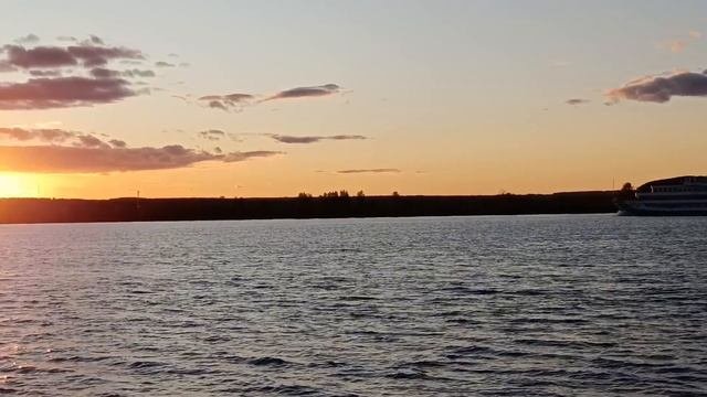 Ах, белый теплоход...в закатных лучах солнца.