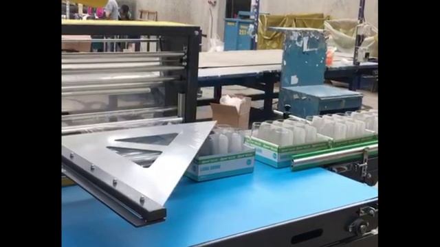 Машина для термоусадочной упаковки стеклянных стаканов
