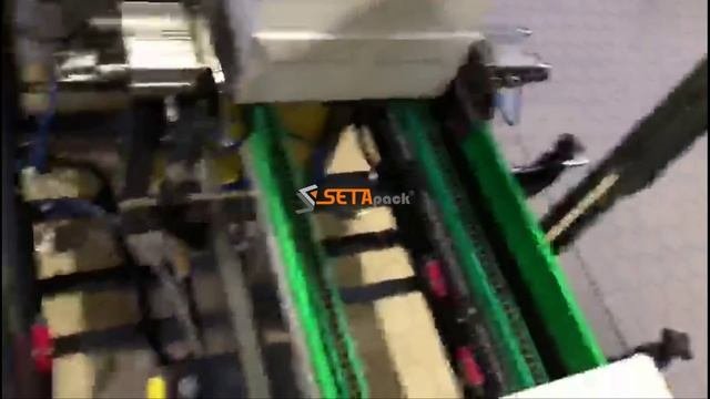 Машина для упаковки молока в термоусадочную пленку