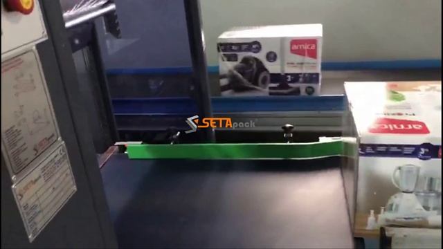 Машина для упаковки картонных коробок в термоусадочную пленку