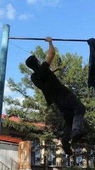 2 one arm pull ups (1 right arm, 1 left arm)