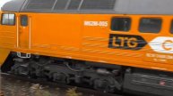 Тепловоз M62M-005 LTG CARGO следует резервом
