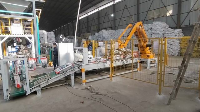 Робот-паллетоукладчик с двойным гриппером