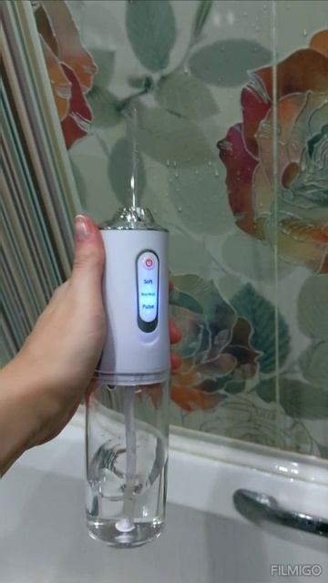 Портативный ирригатор для полости рта. Проверка работоспособности.