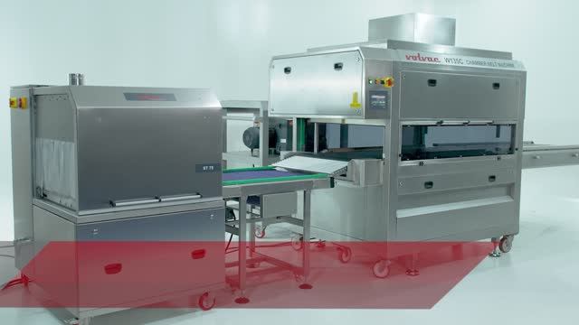 Термоусадочная линия на базе вакуумной конвейерной машины VOLVAC W135C