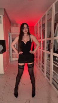 Beautiful girl in stockings and sexy legs in nylon