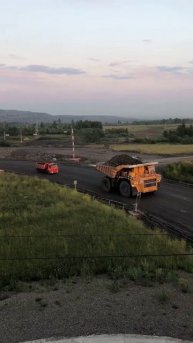 БелАЗ а заним малютка КАМАЗ