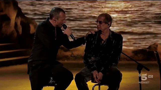 В 2019 году в городе Верона, выступление Челентано и Бьяджо Антоначчи, песня Бьяджо Mio fratello