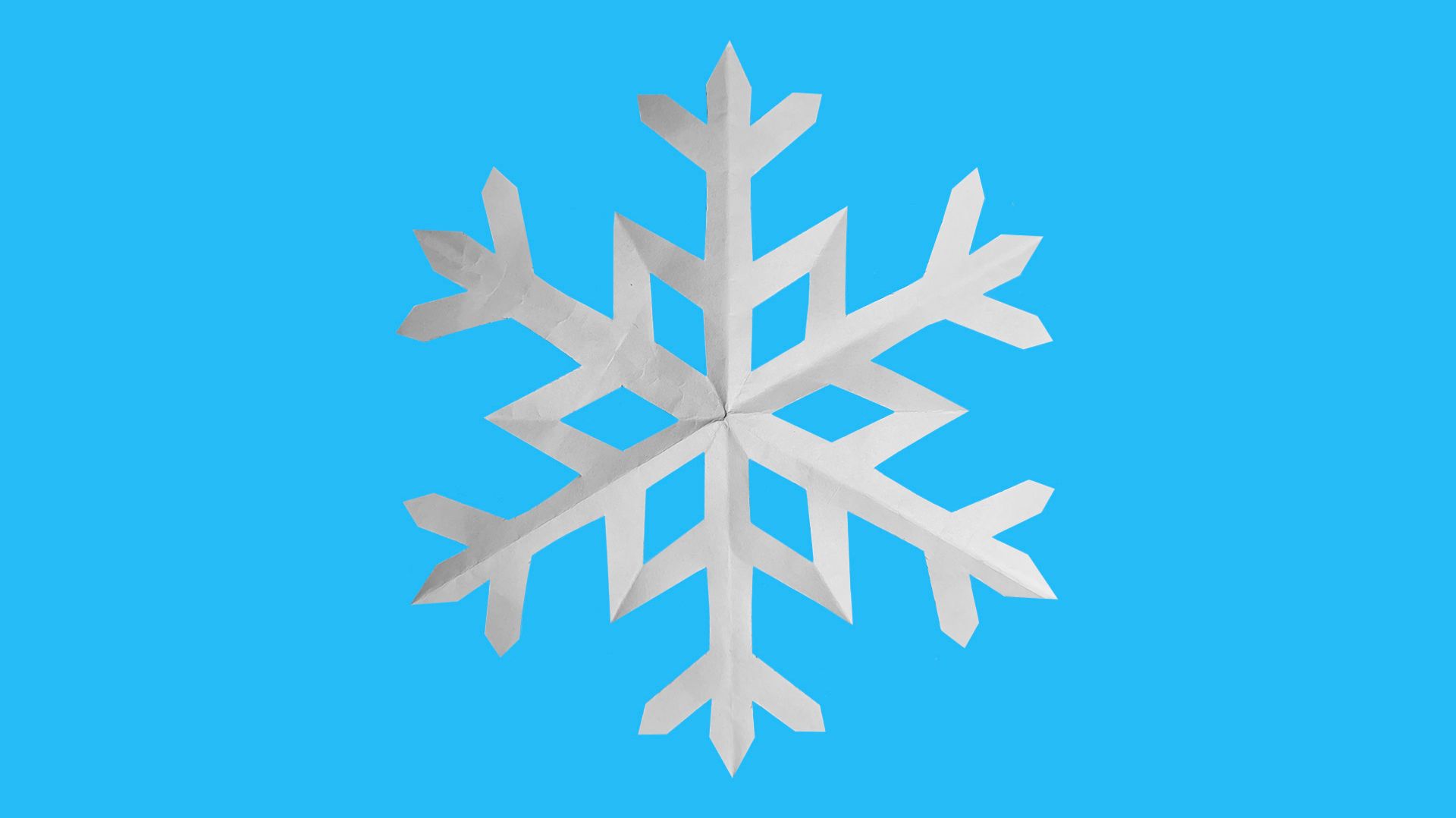 Как сделать снежинку из бумаги. Снежинка из бумаги. Новогодняя поделка