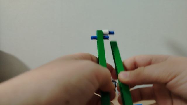 Как сделать пистолет стреляющий резинками из Lego