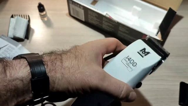Машинка для стрижки волос Мозер 1400 белая.