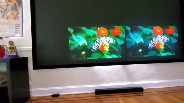 Side by side Christie projector's  LWU420 1080p and LX400  720p on the supreme black ALR 12