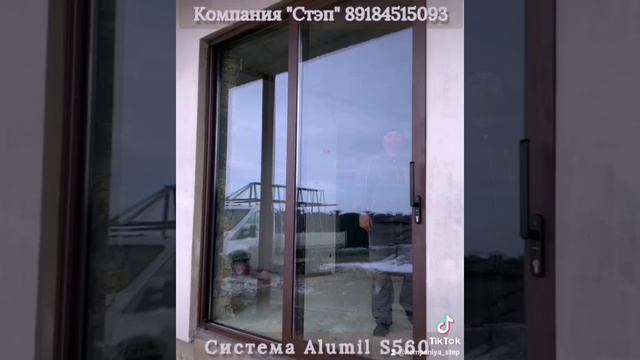 Тёплая раздвижная алюминиевая дверь Сочи