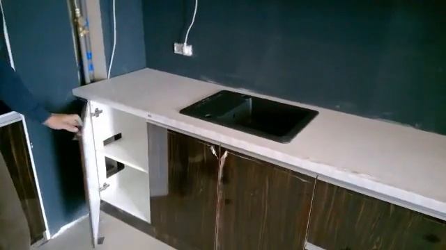 Кухня без ручек с фурнитурой Blum от Taller Rosenfeld
