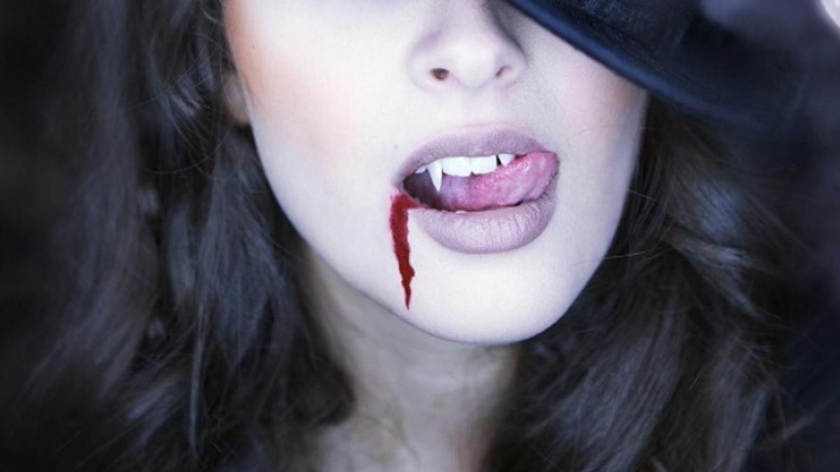Vampire drains victim pic