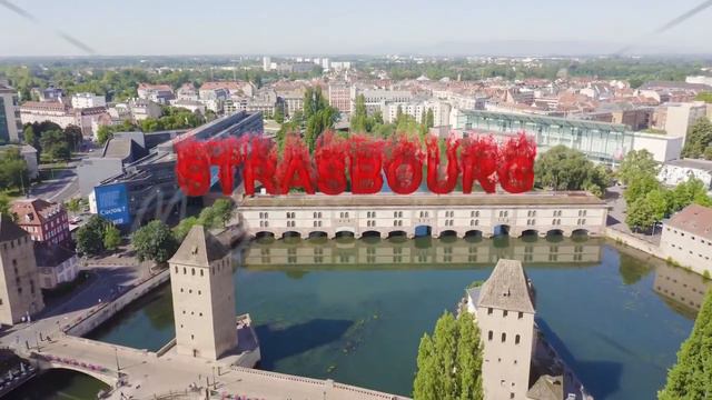 Inscription on video. Strasbourg, France. Quarter Petite France, Vauban Dam. Flames with dark fire,