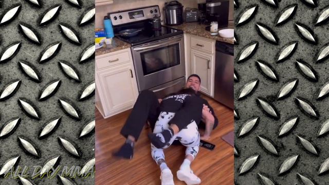 Alex "Poatan" Pereira Grappling with Polyana Viana in the Kitchen