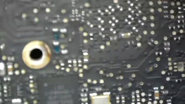 Apple Macbook Logicboard Under Microscope While Repairing in Srilanka Macfix.lk