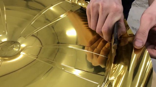 Оклейка дисков золотом для BMW 7
