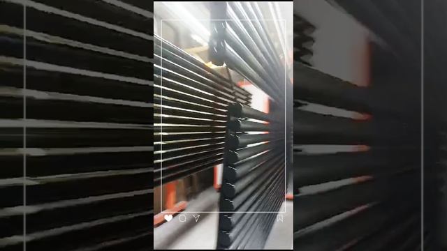Покраска овальных дизайнерских радиаторов в черный на производстве Steel Hot