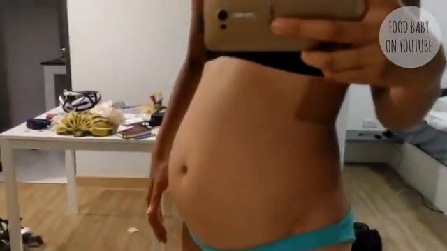 Food baby in bikini