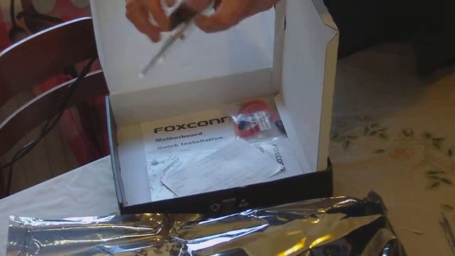how to Open a  box with new Foxconn   motherboard in