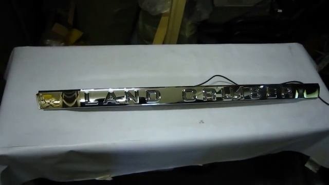 Toyota Land Cruiser 200 накладка на дверь багажника с огнями