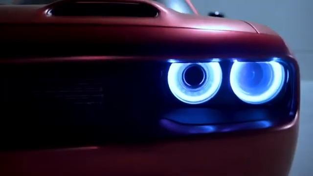 Satin red chrome vinyl wrapped wide body Hellcat