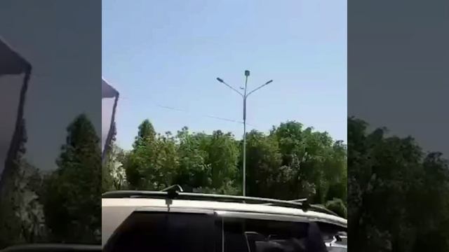 В Казахстане местный житель с криками это Казахстан сорвал с машины русского парня знамя Победы.