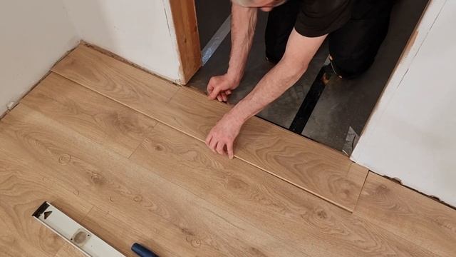 Installing Laminate flooring through the doorway | Installing & Tips #8