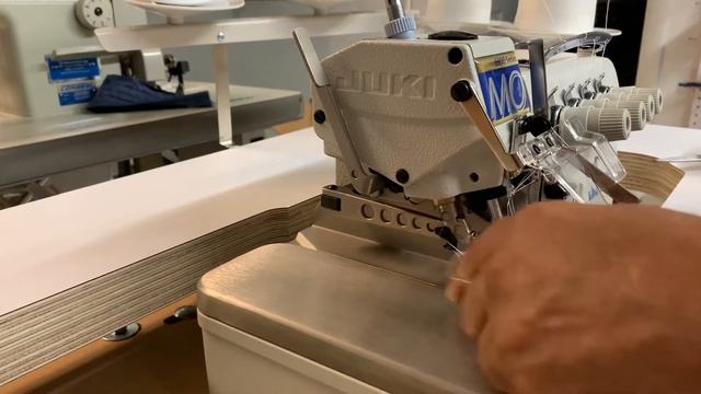 Juki 6814 2 Needle 4 Thread Overlock with Elastic Attachment. Complete with table stand and Motor.