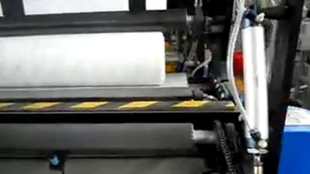 Embossing, lamination, rewinding machine