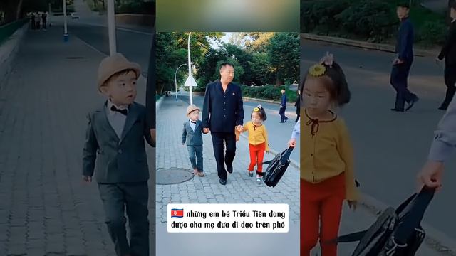 Kids walking on the street with their parents 🇰🇵🇰🇵